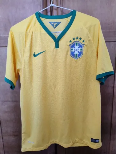 Camisa home brasil 2014 - tamanho m - em ótimo estado,somente com detalhe do nome atrás.