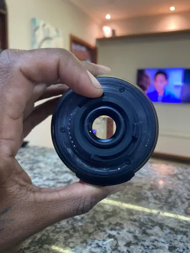 Lente nikon 18-105 com tampas e parasol 