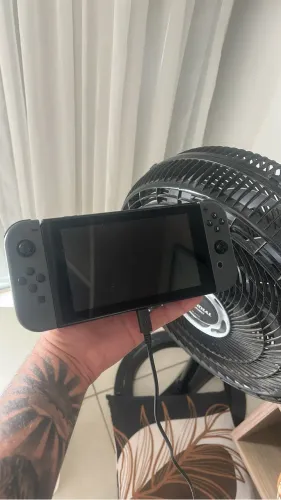Nintendo switch + Zelda , Pokémon, Barbie, animal crossing , dock e joycon 