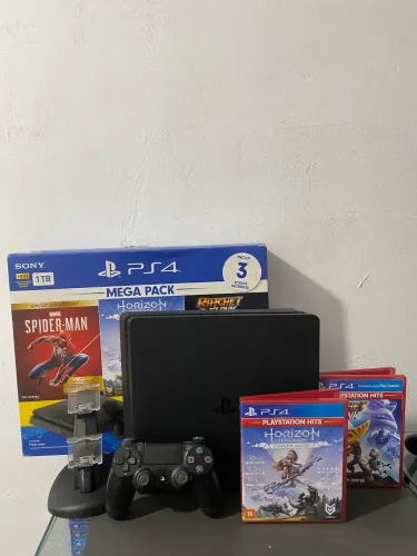 Ps4 SLIM 1 TERA COM CAIXA