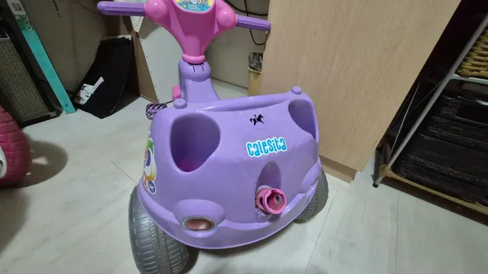 Triciclo calesita menina