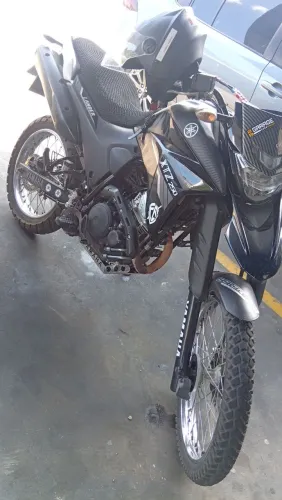 Aceito carro semi novo pra assumir parcelas. Moto em dias No meu nome