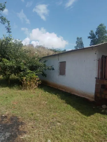 Casa e terreno a venda