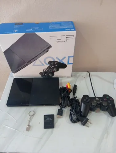 Playstation 2 completo na caixa com vários jogos