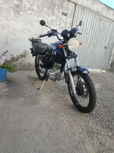 Titan 125 2004 arrumada é ela toda em dias no ponto de transferir .