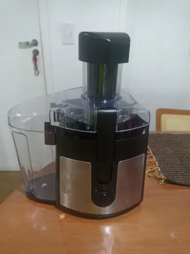 Extrator de suco de frutas e vegetais