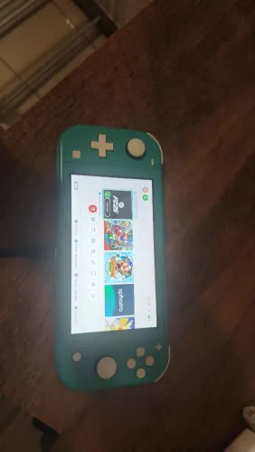 Nintendo switch desbloqueado lite com 4 jogos e cartão de memória de 128 gb