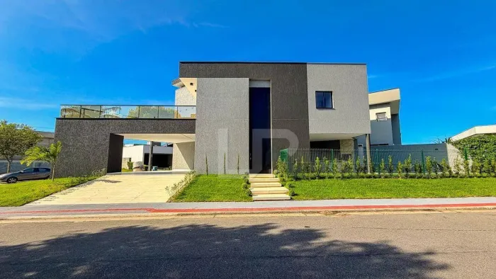 Casa com 3 dormitórios à venda, 284 m² por R$ 3.200.000 - Condominio Ecologico Parque da L