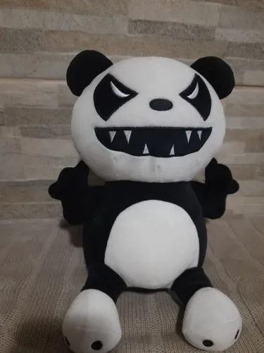 Pelúcia de urso mostrinho 