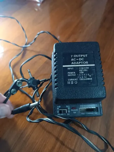 Fonte Universal Ajustável 1,5V a 12V 1A + Ponteiras | Envio OLX Pay