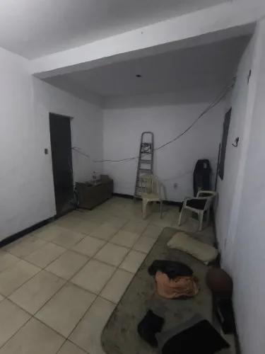 Vendo uma casa a um passo da orla,quadras de futebol,tênis quadras de exercícios