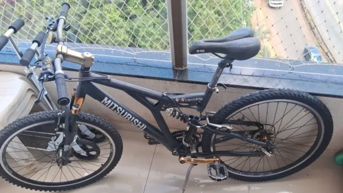 Bicicleta usada Mitsubishi 4x4 ? aro 26, dupla suspensão, 21 marchas.