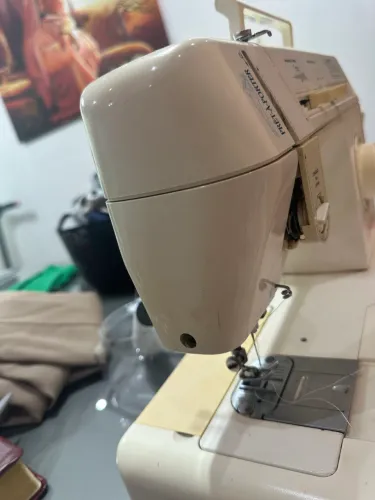 Máquina de costura singer
