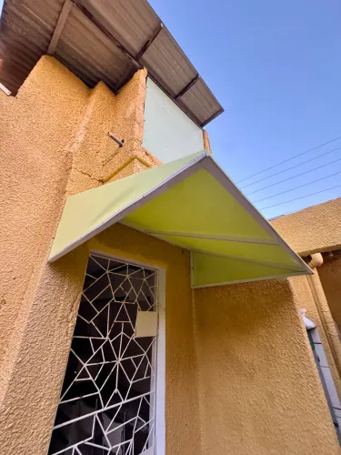 Toldo fixo e alumínio e lona