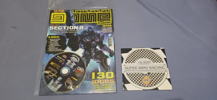Revista + CD-Rom Deus EX + Super Mini Racing + 128 Games jogos