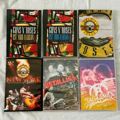 Lote com 6 DVDs de shows de Guns N' Roses, Metallica e Aerosmith, vendidos juntos