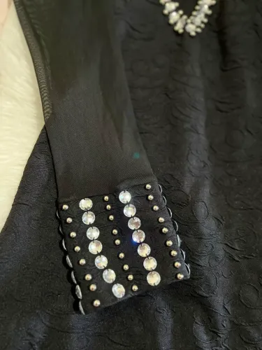 Roupas com 50% de desconto