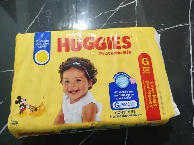 Fralda huggies proteção dia com 52 unidades, tamanho G.