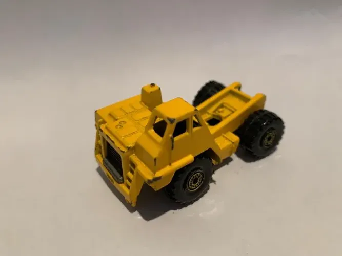 Miniatura Carrinho Hot Wheels Caterpillar Yellow Truck - 1979