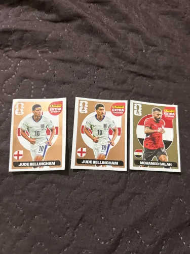 Figurinhas Extras fifa 2026 jude bellingham bronze e mohamed salah gold