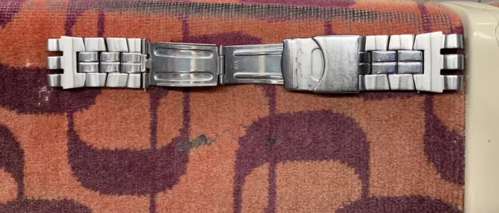 Pulseira de Swatch série prata cara branca