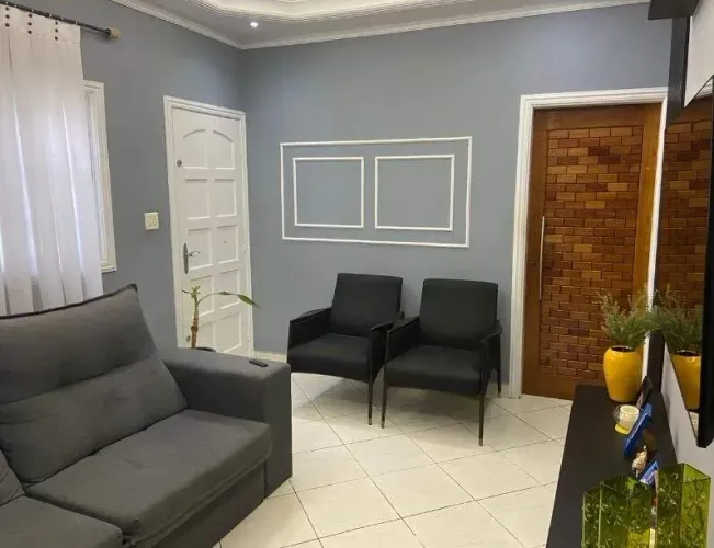 Casa com 3 dormitórios à venda, 170 m² por R$ 640.000,00 - Vila Guilhermina - Praia Grande