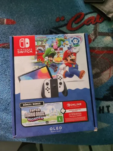 NITENDO SWITCH OLED 64GB COM NOTA FISCAL 4 MESES DE USO NA GARANTIA SEM MARCAS DE USO