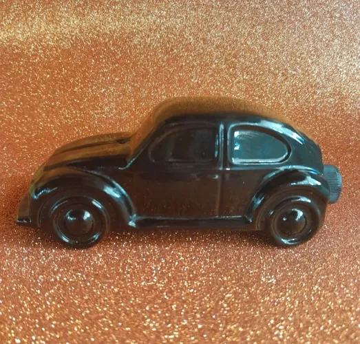 Frasco de perfume/loção pós-barba Avon, em formato de Volkswagen Fusca