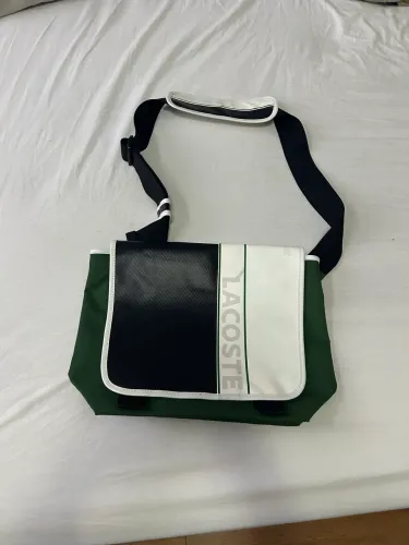 Bolsa Lacoste original usada praticamente nova bolsa notebook e cadernos viagem
