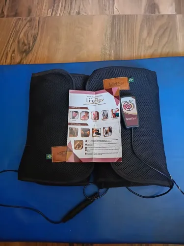 Aparelho para fazer fisioterapia em casa. Tem três velocidades e botao para fazer calor.