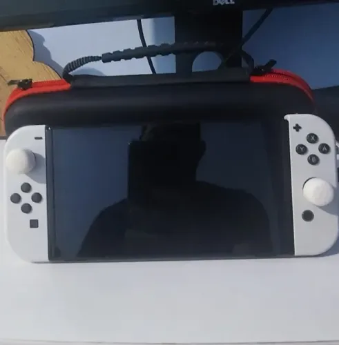 Nintendo Switch Oled 64gb + Carregador 