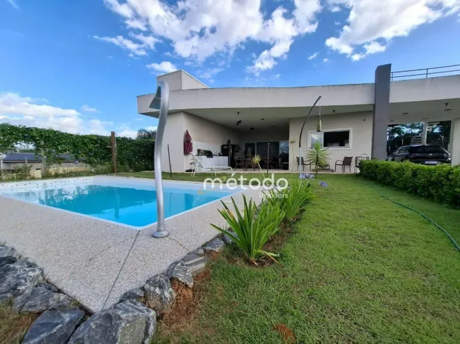 Casa com 3 dormitórios à venda, 228 m² por R$ 1.700.000,00 - Condomínio Lago Dourado - Jac