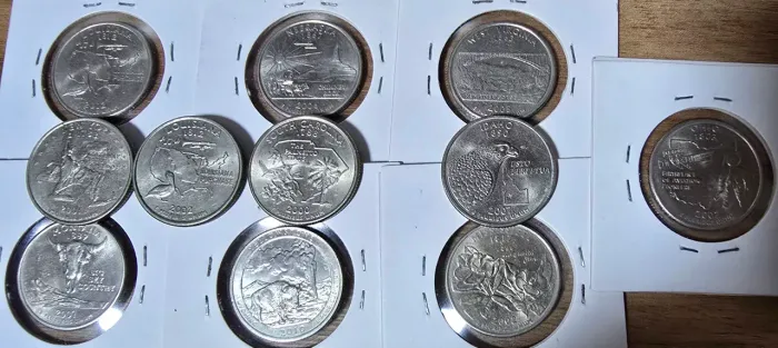 11 moedas quarter dólar _ estados e parques.<br>50,00 + frete
