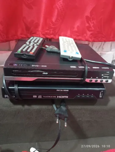 Um Dvd novo e outro usado poucas vezes para vender todos como controle remoto e cabos