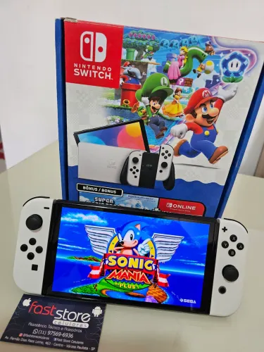 Lacrado! Desbloqueado Nintendo Switch OLED Mario bros Wonder! Lotado de jogos + garantia