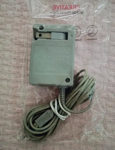 Carregador original Nintendo 3ds, New 3d xl novinho, apenas 145