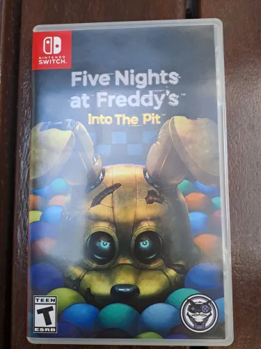 Jogo fnaf into the pit Nintendo Switch 1 e 2