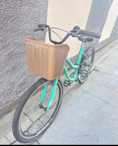 Bicicleta aro 26 verde tiffany, com cesta