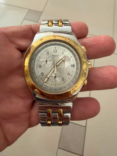 SWATCH PRATA DETALHE EM DOURADO