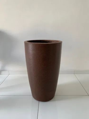 Vaso de planta material semelhante a pedra