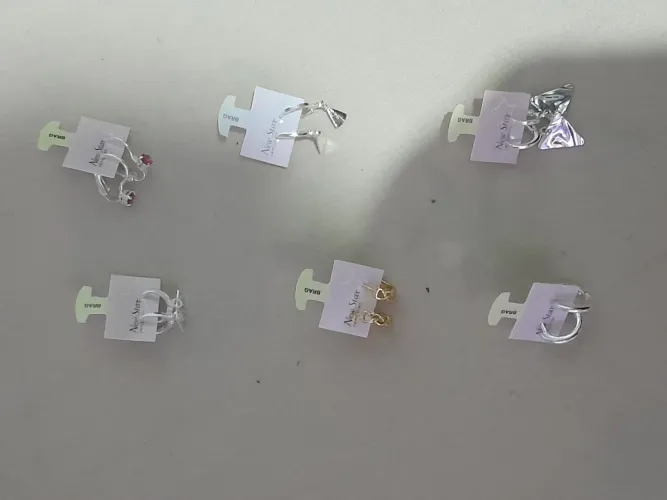 Brincos e pulseira de relógio novos