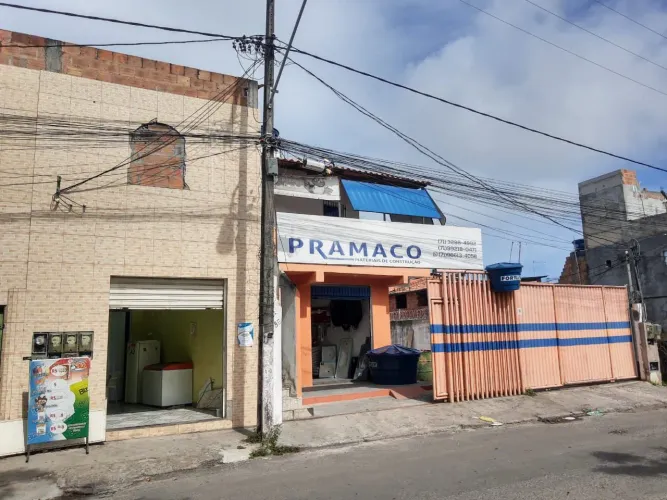 Casa e ponto comercial e terreno