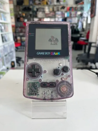 CONSOLE NINTENDO GAME BOY COLOR ROXO TRANSLÚCIDO + 1 CARTUCHO SORTIDO SEMINOVO - NINTENDO