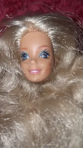 Cabeca da boneca Barbie