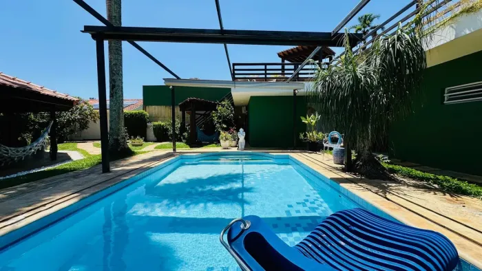 Casa á venda na Praia do Pernambuco no Guarujá | Exclusividade QVista Inteligência Imobili