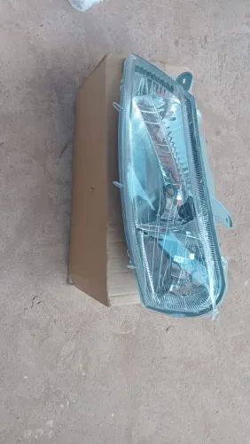 Farol esquerdo  celta 99/06 esta novo na caixa 