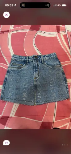 saia jeans lança perfume/easy com strass 34
