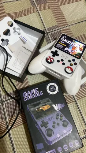R36s /cartão 64GB/ 15.000 jogos + caixa + fone de ouvidos + Case ( manual e acessórios) ?