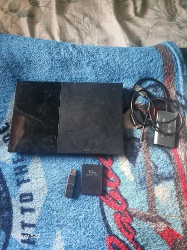 PS2 slim com memory card 16mb sem controle acompanha jogos