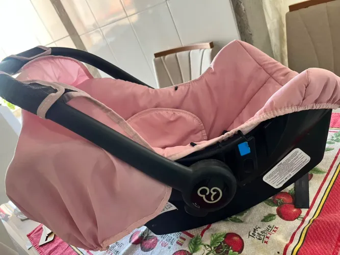 Bebê conforto rosa - seminovo ?